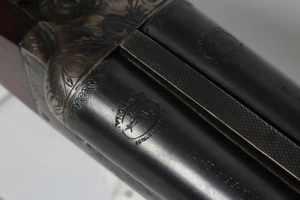 A LAURONA 20 BORE SIDE BY SIDE SHOTGUN, with 27 3/4" barrels and manual safety, 44 3/4" overall Image