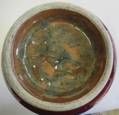 A CHINESE SANG DE BOEUF GLAZED VASE of baluster form with two fixed ring and tassel 'handles' Image