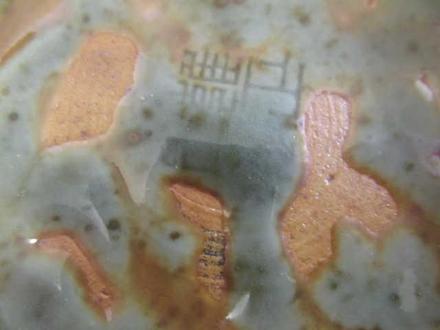 A CHINESE SANG DE BOEUF GLAZED VASE of baluster form with two fixed ring and tassel 'handles' Image