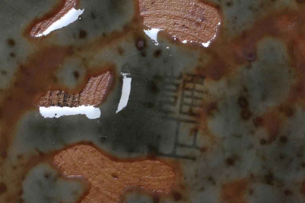 A CHINESE SANG DE BOEUF GLAZED VASE of baluster form with two fixed ring and tassel 'handles' Image