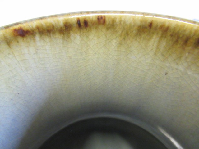 A CHINESE SANG DE BOEUF GLAZED VASE of baluster form with two fixed ring and tassel 'handles' Image