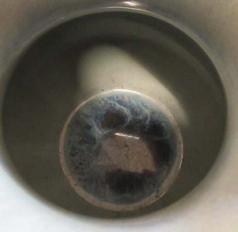 A CHINESE SANG DE BOEUF GLAZED VASE of baluster form with two fixed ring and tassel 'handles' Image