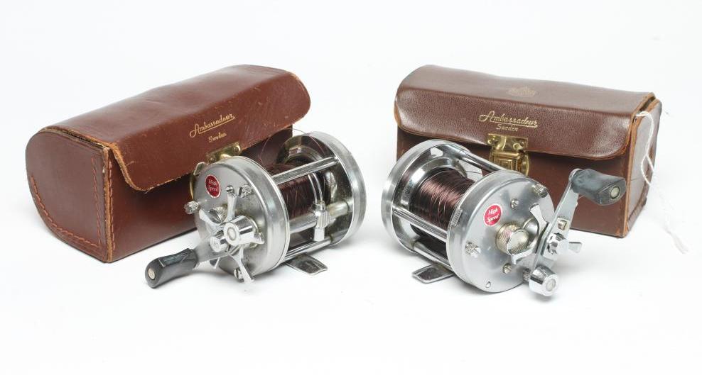 TWO ABU AMBASSADEUR 6500C FISHING REELS, both bright metal and in leather cases (Est. plus 24% Image