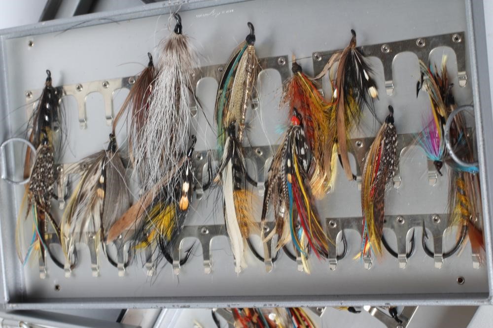 TWO LOCKABLE FLY BOXES OF APPROXIMATELY 137 SALMON FLIES, including antique examples and a small Image