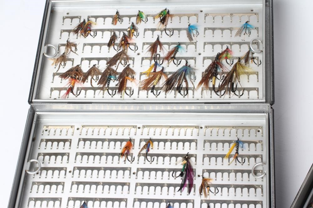 TWO LOCKABLE FLY BOXES OF APPROXIMATELY 137 SALMON FLIES, including antique examples and a small Image