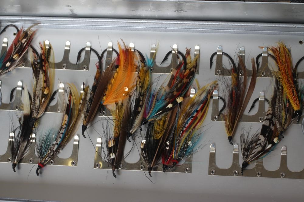TWO LOCKABLE FLY BOXES OF APPROXIMATELY 137 SALMON FLIES, including antique examples and a small Image