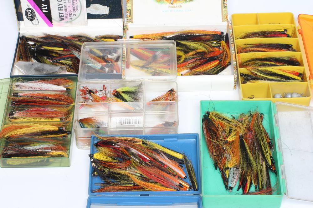 A LARGE QUANTITY OF SALMON TUBE FLIES in four plastic fly boxes (Est. plus 24% premium inc. VAT) Image