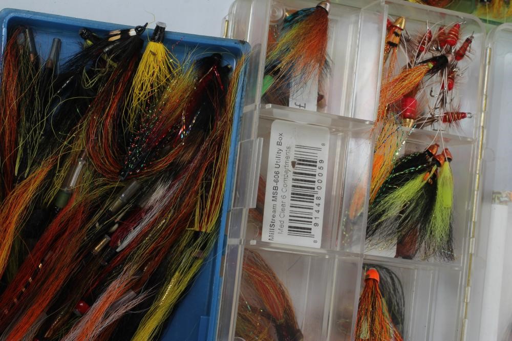 A LARGE QUANTITY OF SALMON TUBE FLIES in four plastic fly boxes (Est. plus 24% premium inc. VAT) Image
