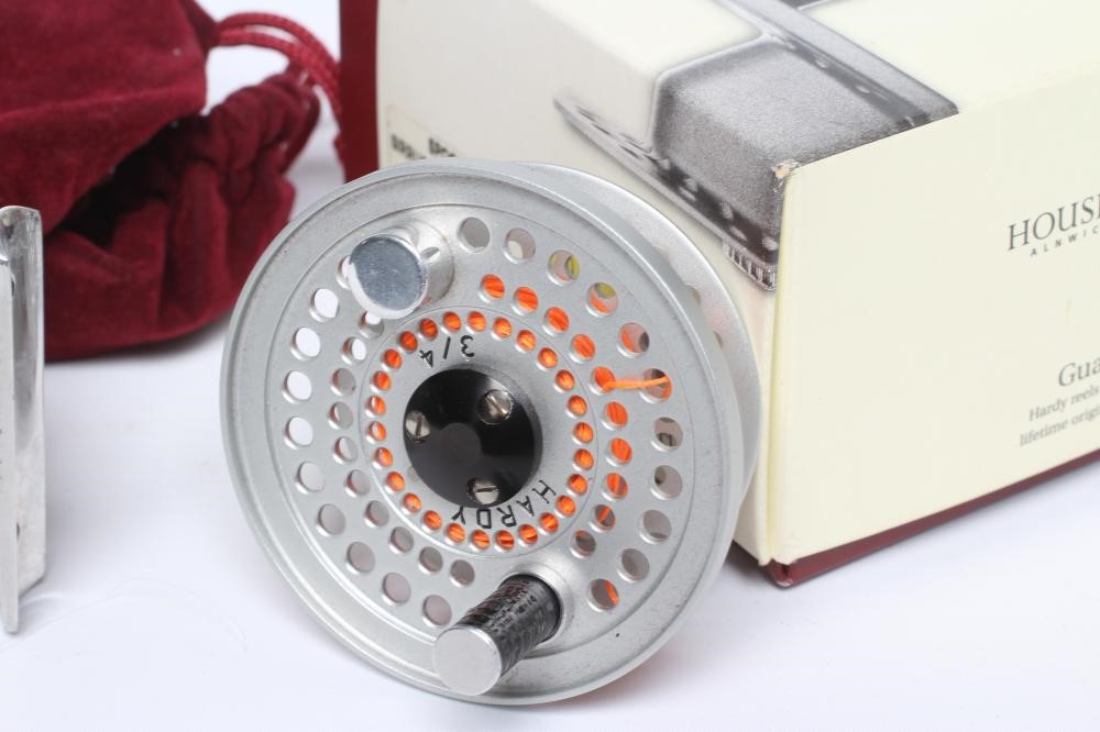 A HARDY SIRRUS FLY FISHING REEL, #3/4, with spare spool, two Hardy bags and Hardy spool box (Est. Image
