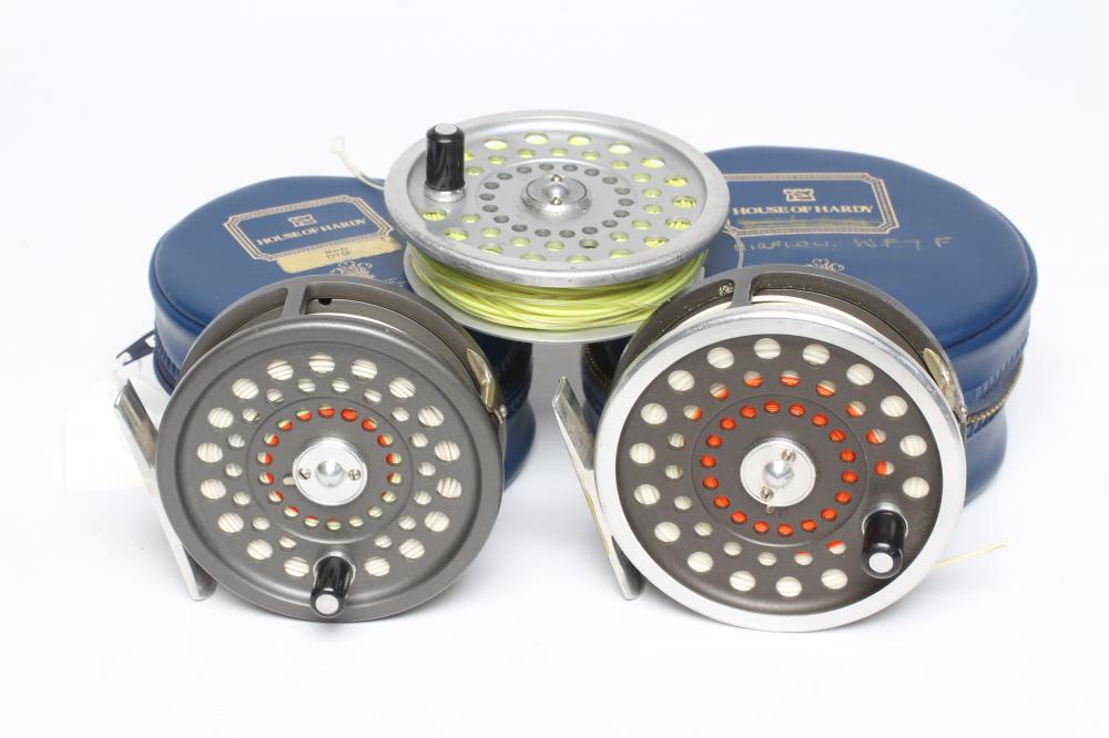 TWO HARDY MARQUIS FISHING REELS, comprising a #6 and a #7, with spare #7 spool and cases (3) (Est. Image