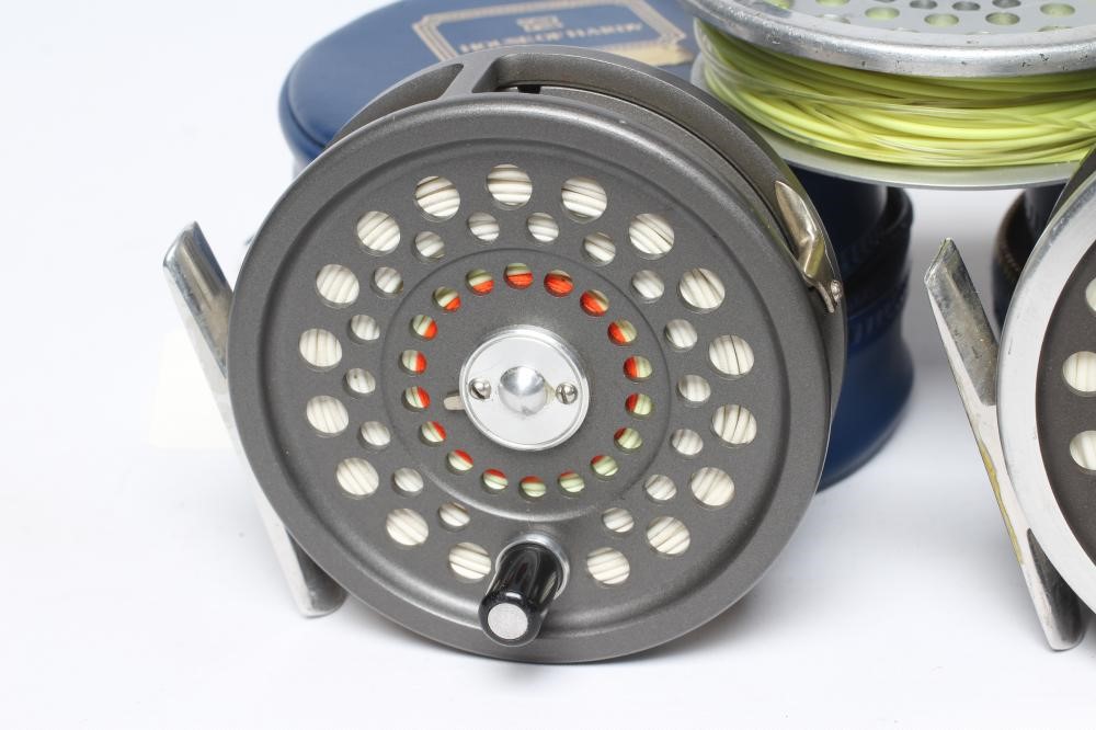 TWO HARDY MARQUIS FISHING REELS, comprising a #6 and a #7, with spare #7 spool and cases (3) (Est. Image