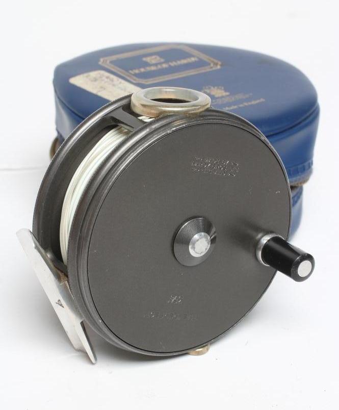 A HARDY THE "PERFECT" 3 5/8" TROUT FISHING REEL with loop line guide, rim tensioner and Hardy bag Image