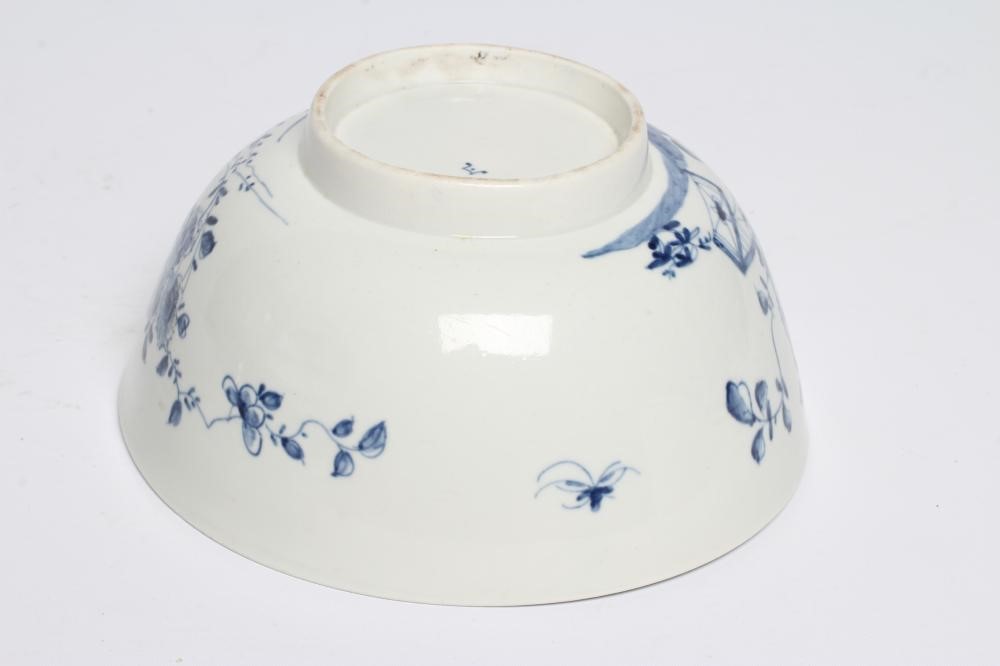 A FIRST PERIOD WORCESTER PORCELAIN BOWL, c.1755-60, painted in underglaze blue with the Prunus Fence Image