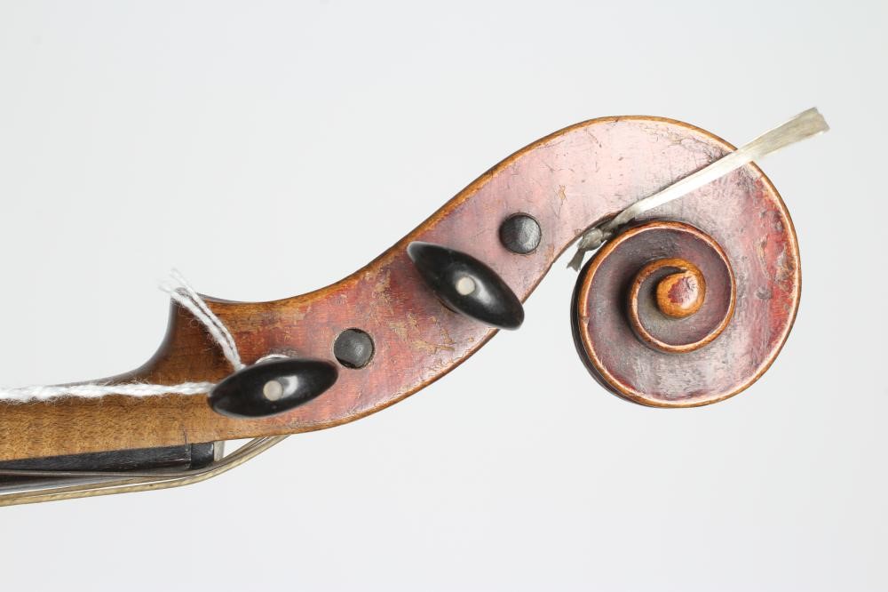 A SMALL VIOLIN with one piece back Image