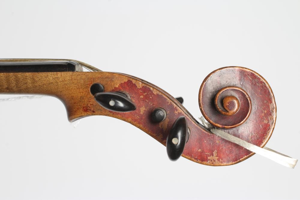 A SMALL VIOLIN with one piece back Image