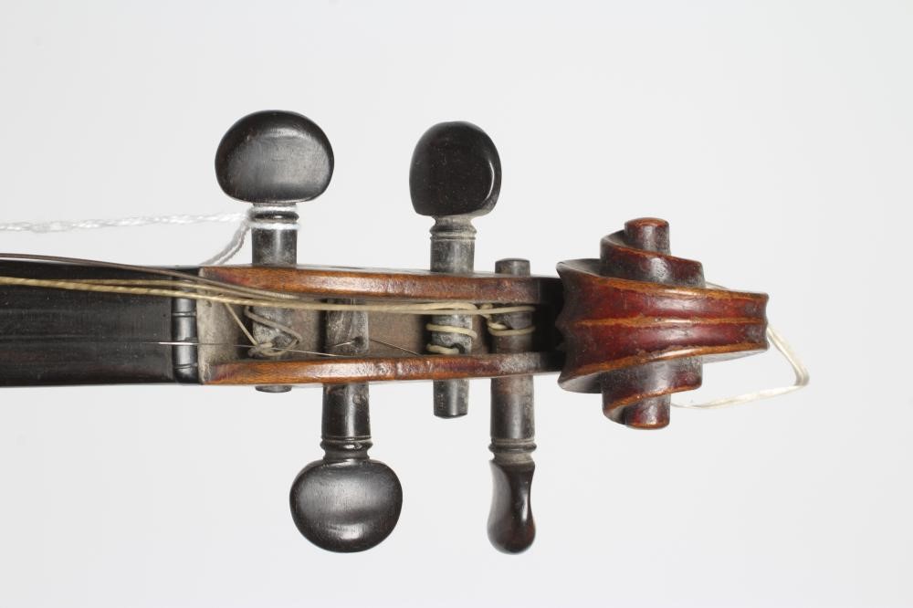 A SMALL VIOLIN with one piece back Image