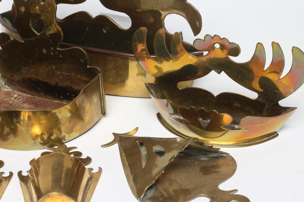 A COLLECTION OF THIRTEEN GEORGIAN AND LATER BRASS WALL POCKETS including two small pairs Image