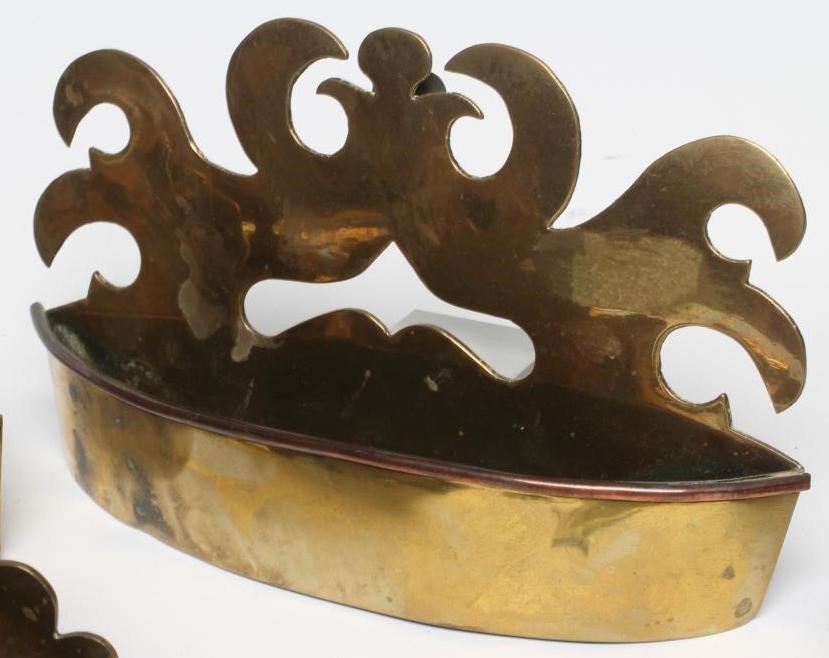 A COLLECTION OF THIRTEEN GEORGIAN AND LATER BRASS WALL POCKETS including two small pairs Image