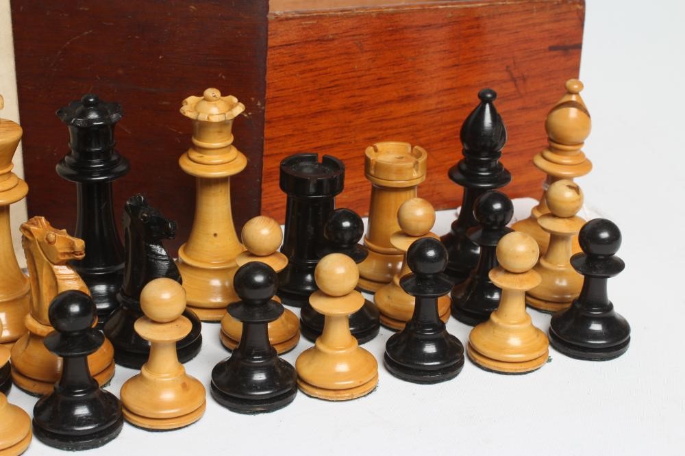 A BOX AND EBONY STAUNTON PATTERN CHESS SET Image