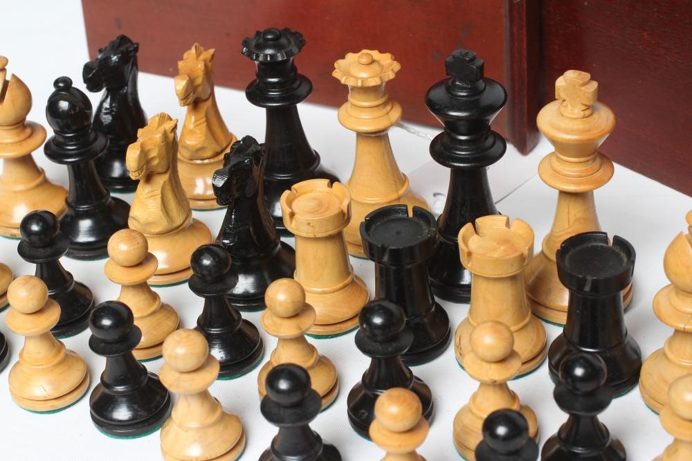 A BOX AND EBONY STAUNTON PATTERN CHESS SET, unmarked, king 2 3/4" high, in a stained box with Image