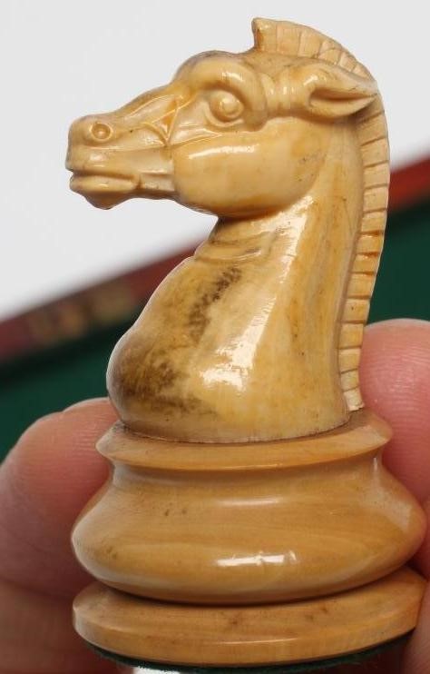 A BOX AND EBONY STAUNTON PATTERN CHESS SET Image