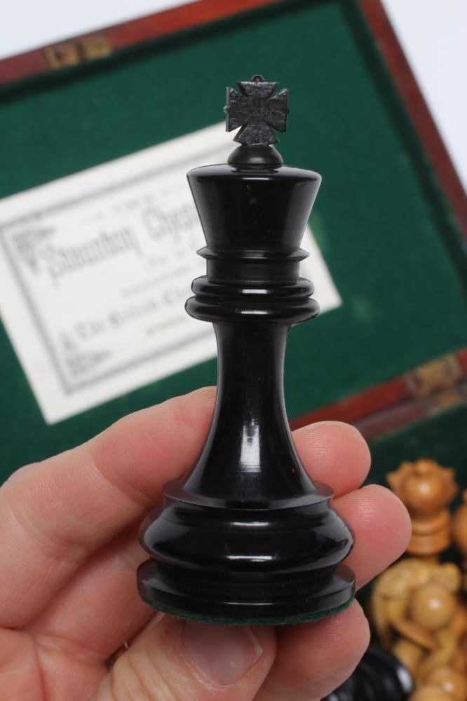 A BOX AND EBONY STAUNTON PATTERN CHESS SET Image
