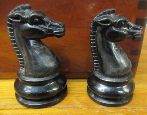 A BOX AND EBONY STAUNTON PATTERN CHESS SET Image