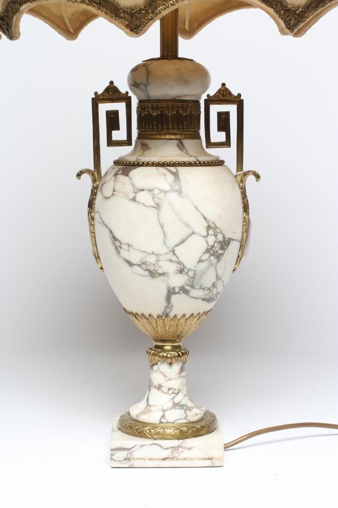 A CONTINENTAL WHITE MARBLE AND ORMOLU MOUNTED TABLE LAMP, early 20th century, of urn form with Image