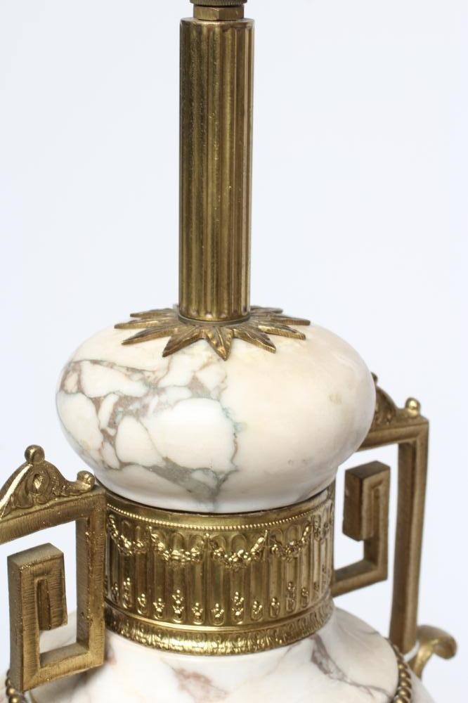 A CONTINENTAL WHITE MARBLE AND ORMOLU MOUNTED TABLE LAMP, early 20th century, of urn form with Image