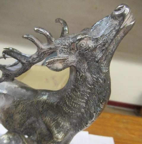 A VICTORIAN CUT GLASS AND PLATED CENTREPIECE with palm tree and deer on a rocky base, 19" high (Est. Image