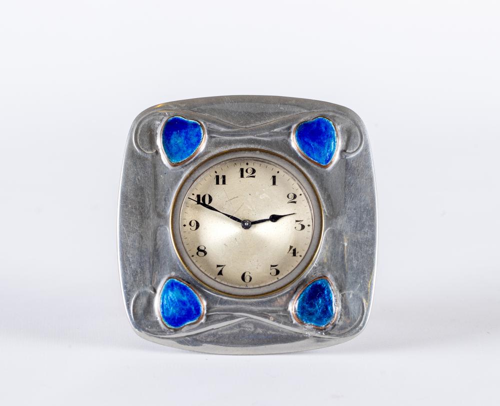 ARCHIBALD KNOX FOR LIBERTY - A TUDRIC PEWTER CASED TIMEPIECE of rounded square form Image