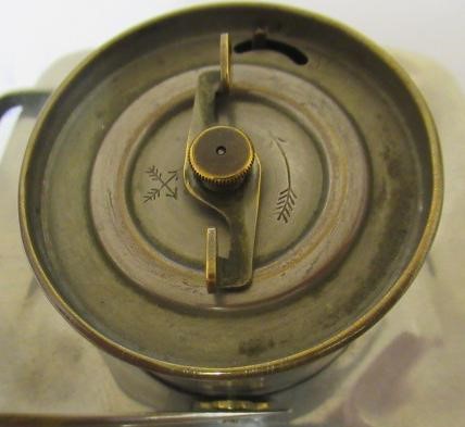 ARCHIBALD KNOX FOR LIBERTY - A TUDRIC PEWTER CASED TIMEPIECE of rounded square form Image