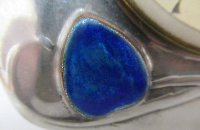 ARCHIBALD KNOX FOR LIBERTY - A TUDRIC PEWTER CASED TIMEPIECE of rounded square form Image