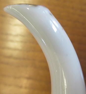 A CHINESE PORCELAIN SMALL COFFEE POT AND COVER of baluster form with ear shaped handle Image