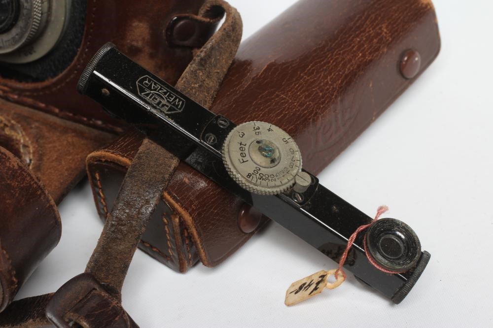 A LEICA WETZLAR DRP CAMERA, no.103462, with Leitz Elmar 1:35F=50mm lens, leather case and cased Image