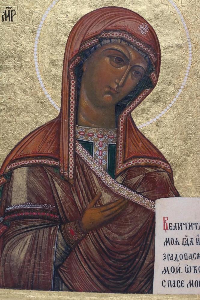 A RUSSIAN ICON, 19th century, the image in green and scarlet robes against a gold ground with Image