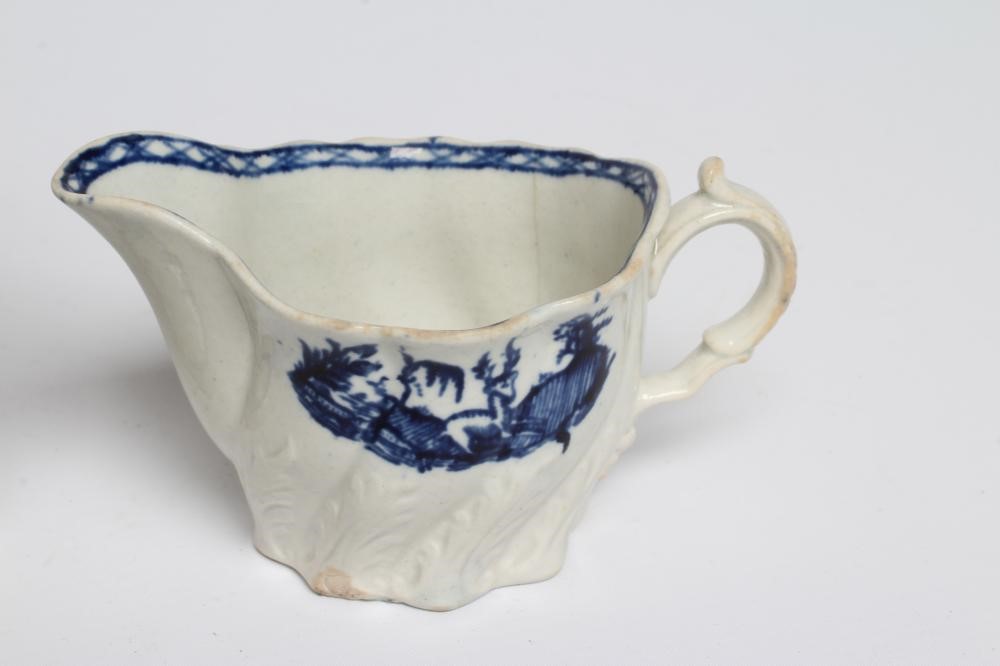 A PENNINGTON'S PORCELAIN SHELL MOULDED BUTTER BOAT Image