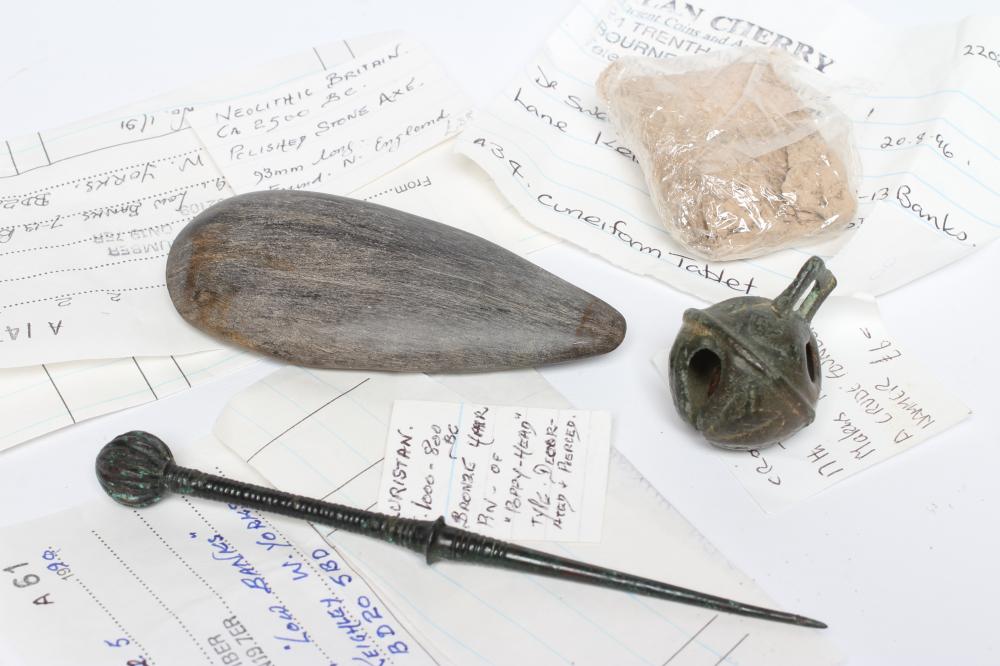 A COLLECTION OF ANTIQUITIES comprising of a cuneiform tablet Image