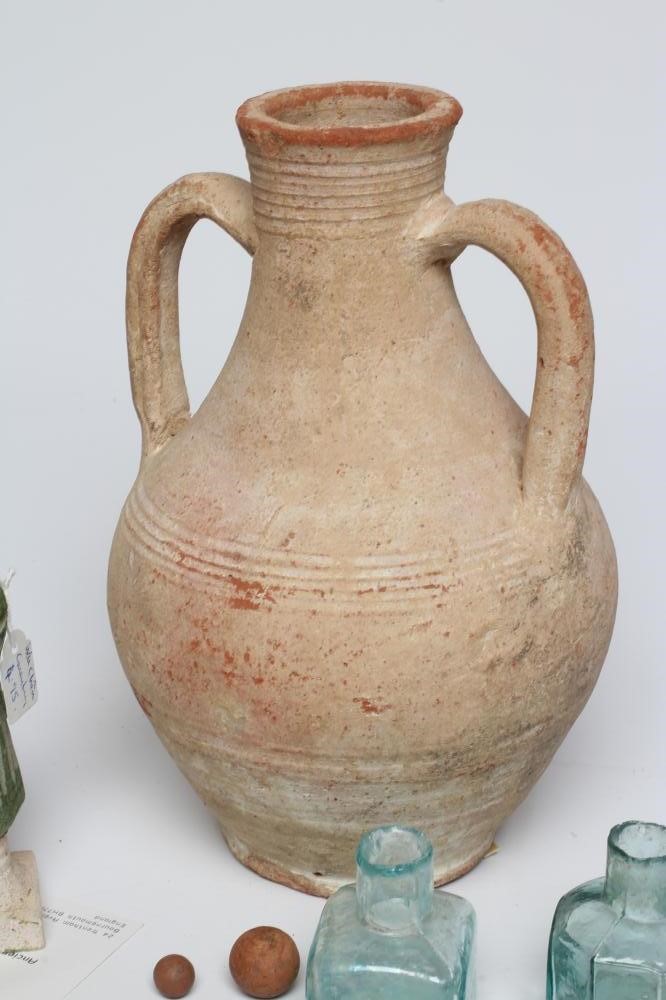 A COLLECTION OF ANTIQUITIES comprising of a Roman terracotta two handled baluster shaped vase Image