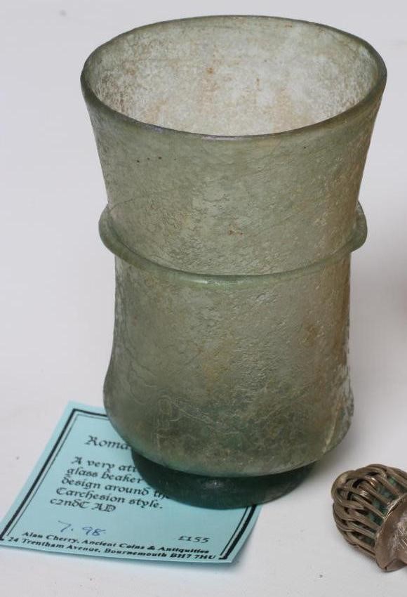 A COLLECTION OF ANTIQUITIES comprising of a Roman terracotta two handled baluster shaped vase Image