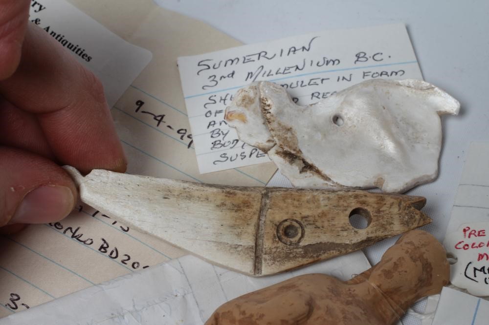 A COLLECTION OF ANTIQUITIES comprising of a pre Columbian Mexican head Image