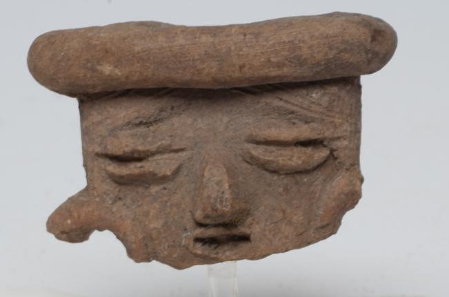 A COLLECTION OF ANTIQUITIES comprising of a pre Columbian Mexican head Image