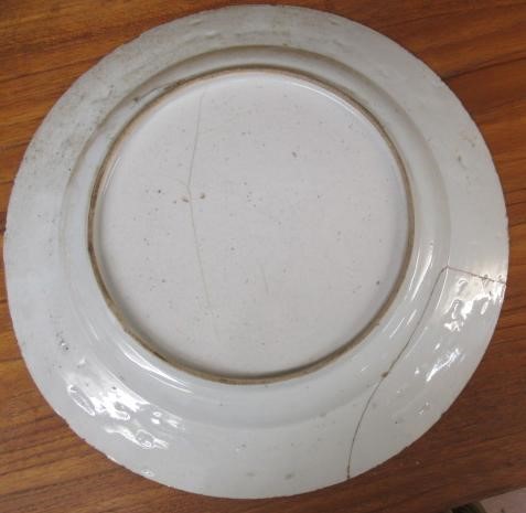 A GRADUATED PAIR OF CHINESE PORCELAIN CHARGERS of plain circular form painted in coloured enamels Image