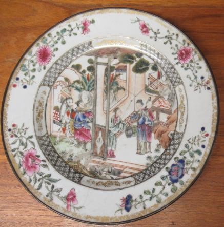 A GRADUATED PAIR OF CHINESE PORCELAIN CHARGERS of plain circular form painted in coloured enamels Image