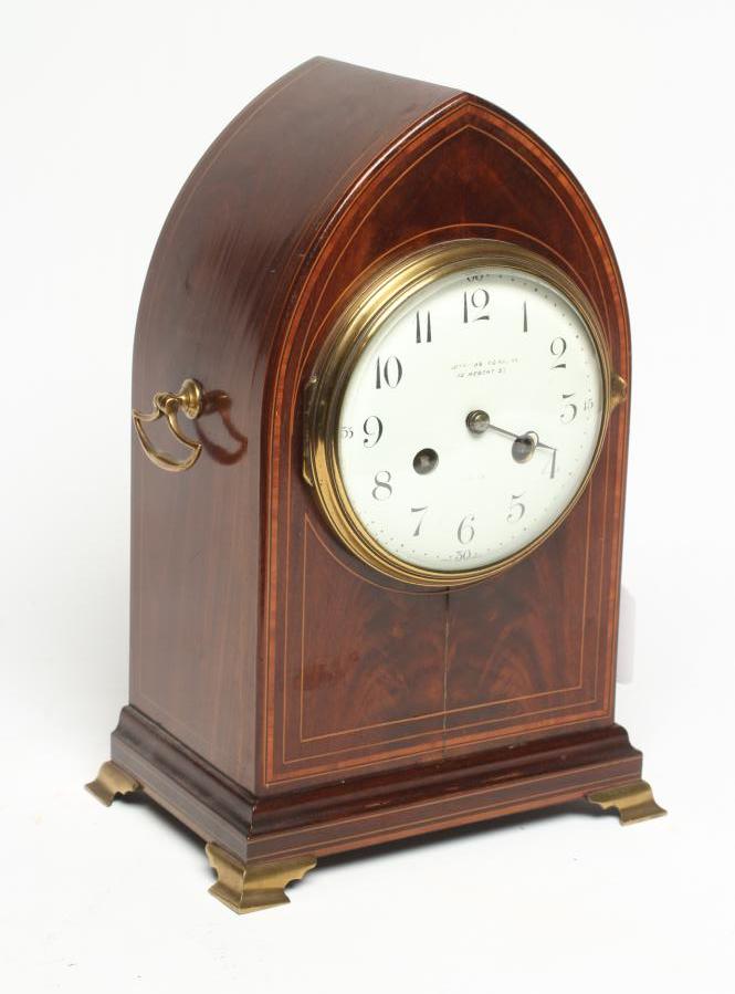 A MAHOGANY CASED MANTEL CLOCK Image