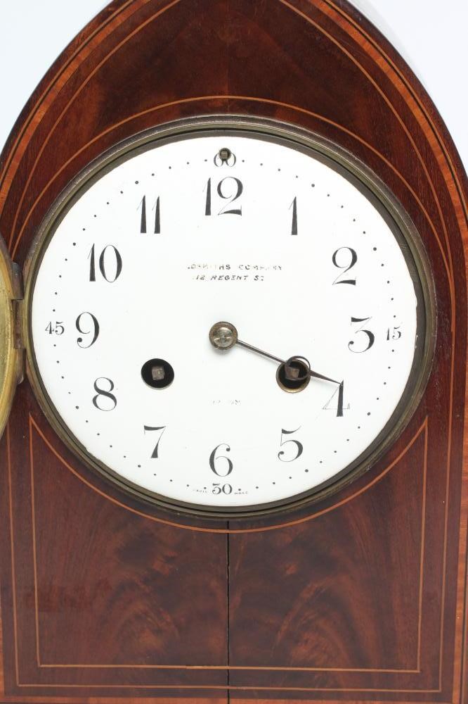A MAHOGANY CASED MANTEL CLOCK Image