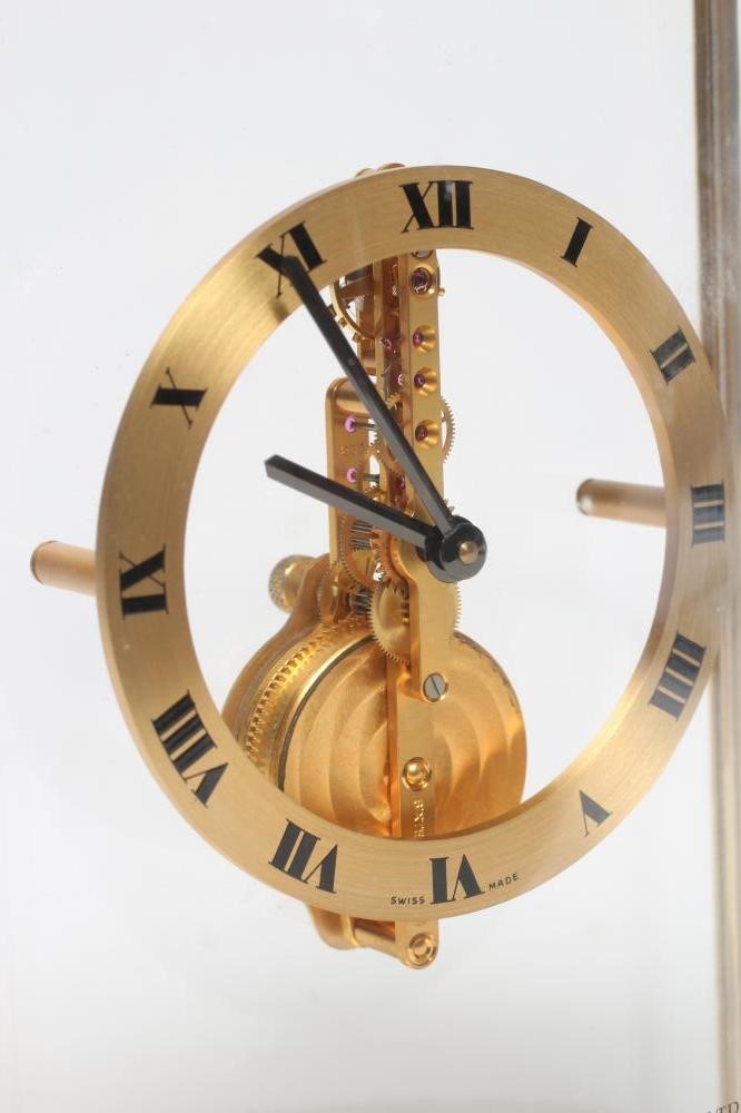 A JAEGER-LECOULTRE SKELETON MANTEL CLOCK with exposed gilt brass jewelled movement Image