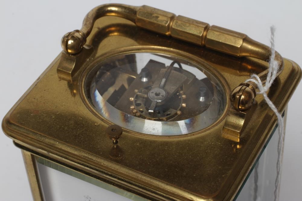 A BRASS CASED CARRIAGE CLOCK Image