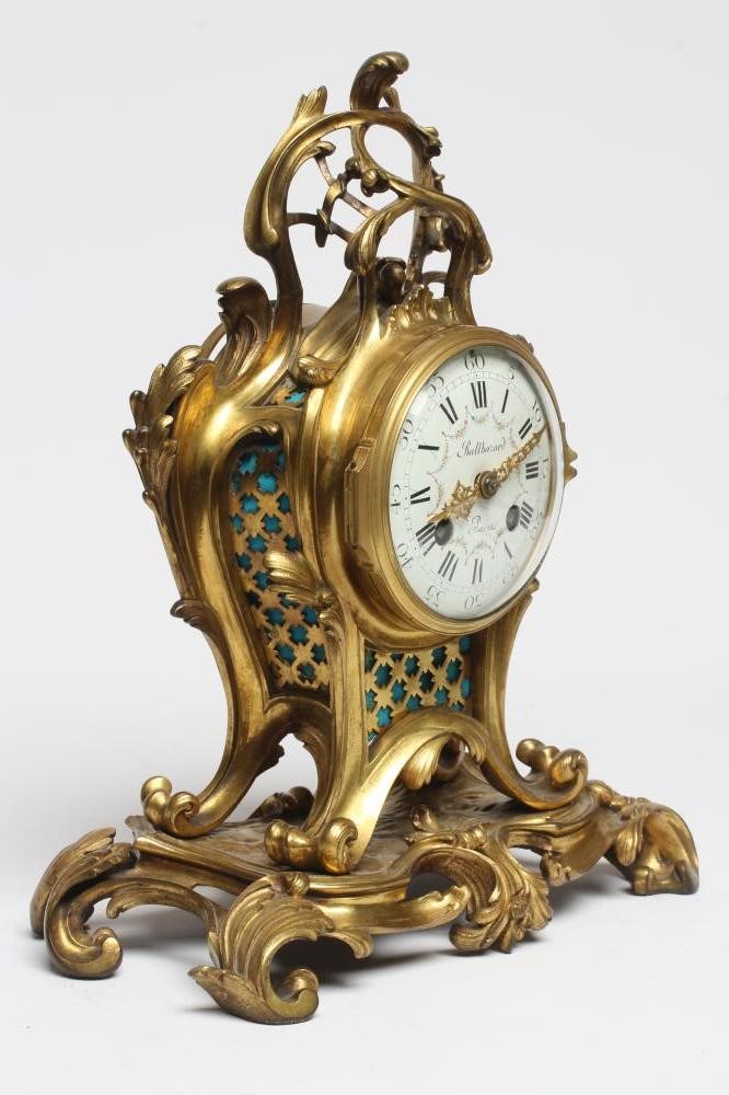 A FRENCH GILT CASED MANTEL CLOCK Image