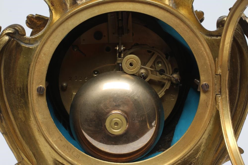 A FRENCH GILT CASED MANTEL CLOCK Image